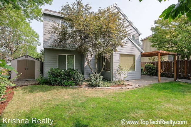 Building Photo - 4 br, 2.5 bath House - 5910 NW Snowlily Dr