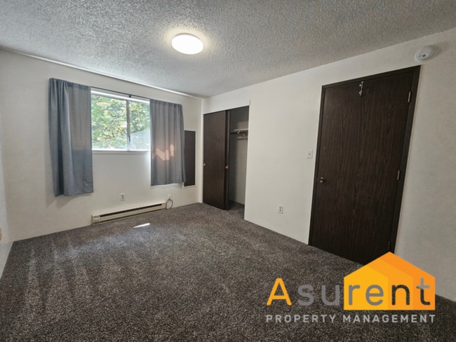 Building Photo - Bright & Spacious 2-Bedroom Apartment in A...