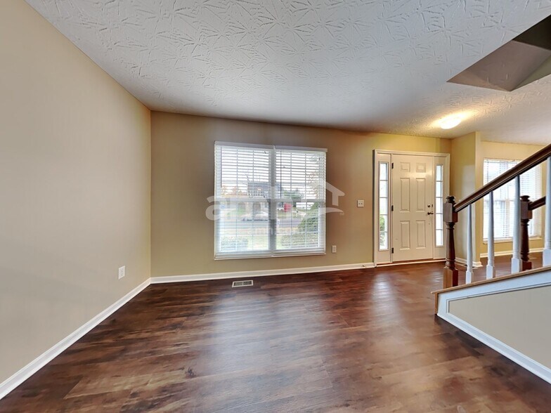 Building Photo - 8888 Woolstone Ct