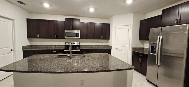 Building Photo - 9910 Spanish Lime Ct