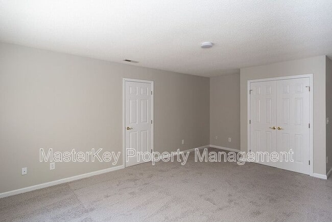 Building Photo - 7916 Strawberry Meadows St