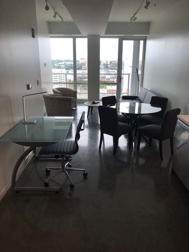 Building Photo - AVAILABLE AUGUST 2026 - Downtown Iowa City High-Rise Condo with Amazing Views