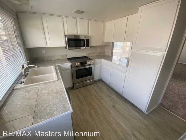Building Photo - 3 br, 2 bath House - 3562 S Kittredge St #A