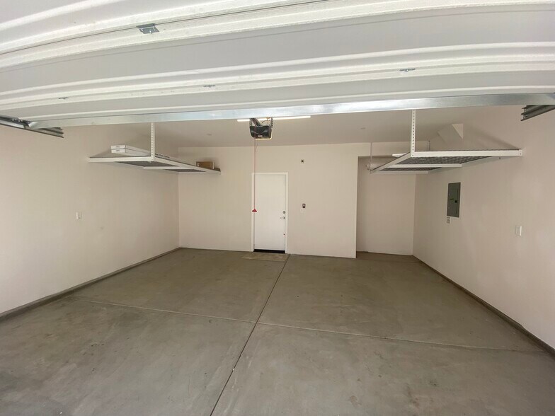 2-car garage with overhead storage - 13086 Olympus Cir