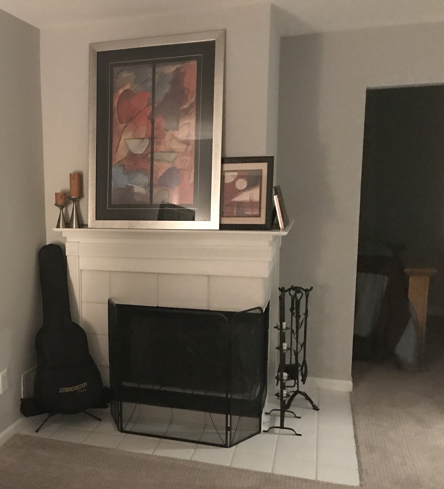 Fireplace on the first level . There is also a library on this floor. - 49730 Plymouth Way