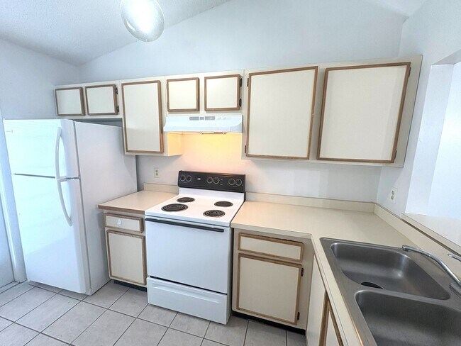 Building Photo - Charming 2-Bed, 2-Bath Home with Vaulted C...