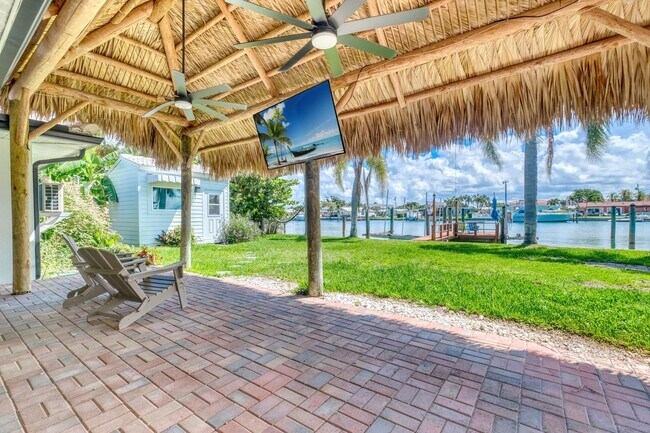 Building Photo - Treasure Island Three Bedroom, Two Bath Furnished Single Family Home on the water.