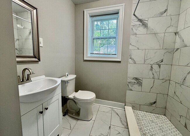 Building Photo - Available now. WATER & SEWER INCLUDED! Gre...