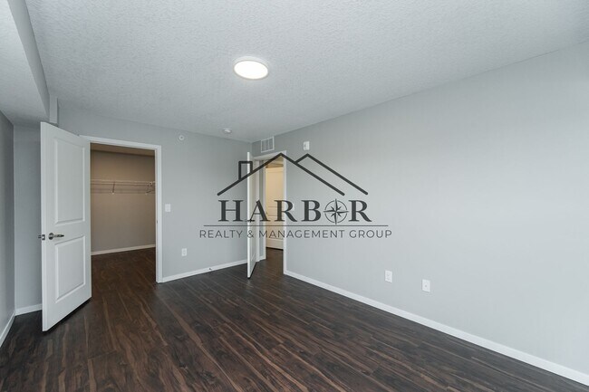 Building Photo - Brand NEW Caroline Apartments 201 -  Move ...