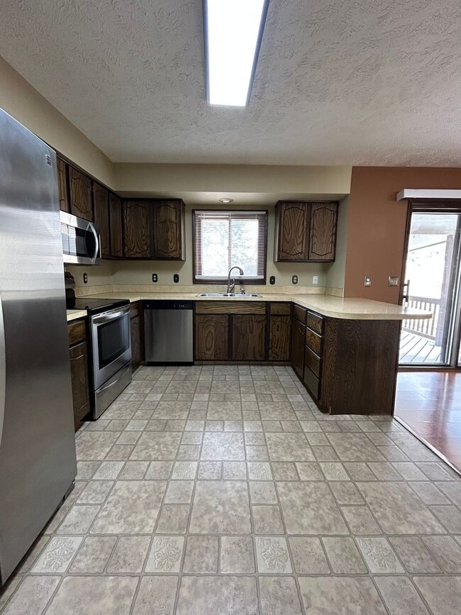 Building Photo - Spacious 3-Bedroom, 1-Bath Home with Garage & Basement in La Vista