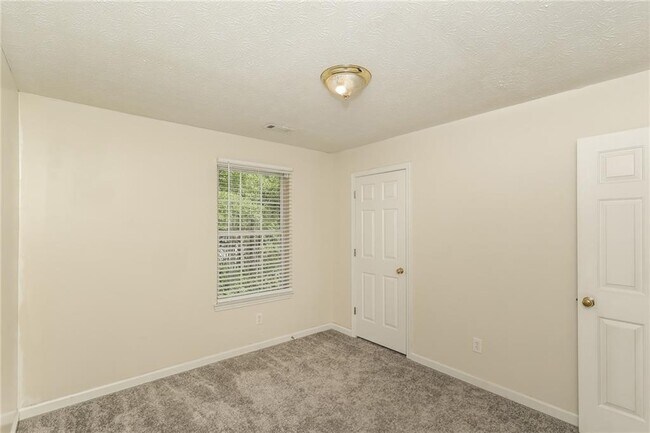 Building Photo - 6076 Camden Forrest Dr