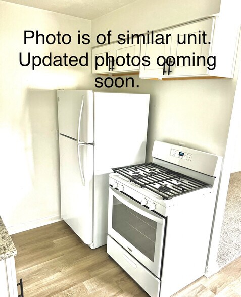 Updated kitchen will look similar with new tile, new countertops, and updated appliances. - 1971 Vaughn St