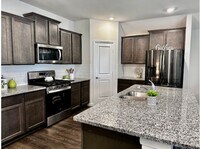 Building Photo - Like New 1 story 4 bedroom home just off D...