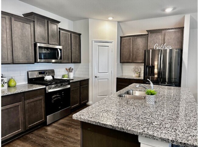 Primary Photo - Like New 1 story 4 bedroom home just off D...