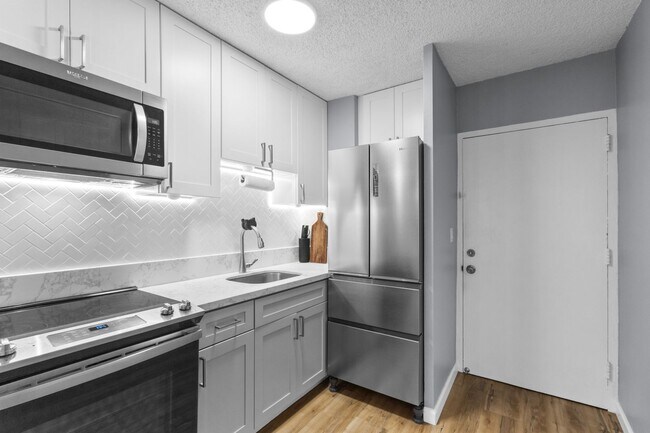 Building Photo - Experience Waikiki Living