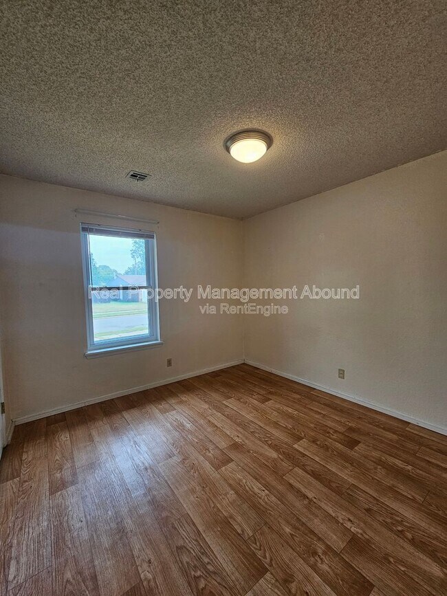 Building Photo - 7710 N 120th Ave E