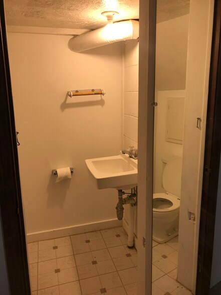 Lower Level Half Bath - 807 W Mission Ave