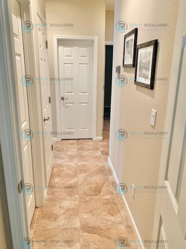 Building Photo - Step into this stunning single-story Damon...