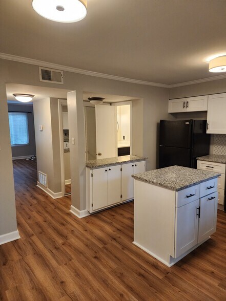 Kitchen view to down stairs half bath - 6967 Staghorn Ln