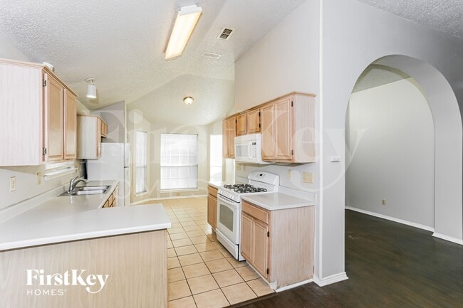 Building Photo - 5309 Tennis Villa Dr