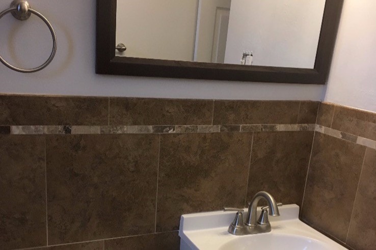 Tile wainscoting in bathroom - 5706 W 37th Ave