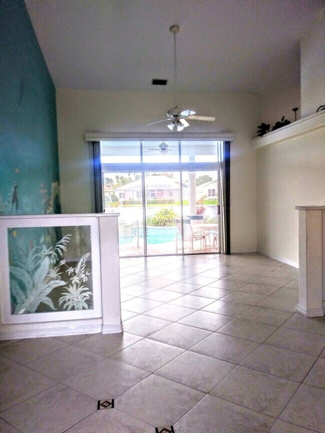 Building Photo - ENJOY LIFE IN THIS 4 BEDROOM UNIQUE LAKE V...
