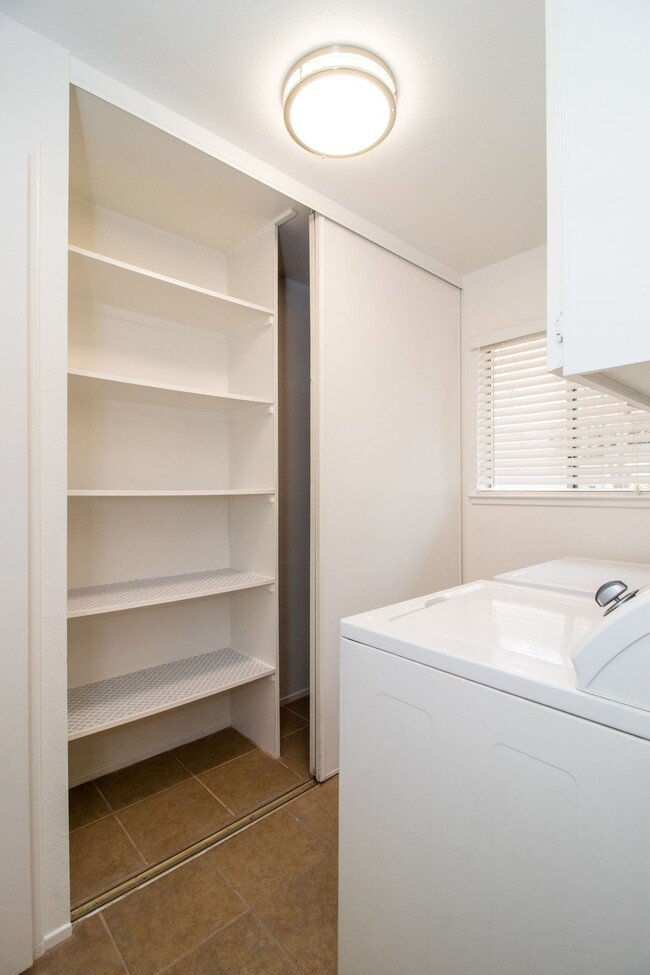 Laundry room with ample additional storage (washer/dryer included) - 4721 N Cedar Ave