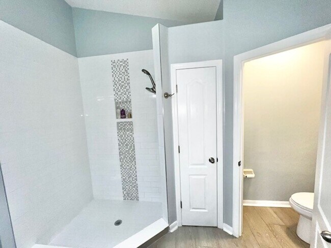 Building Photo - Lake Nona!! Spectacular 4X2 in Gated Nona Crest! All tile flooring!! 2 car garage! Move in April ...