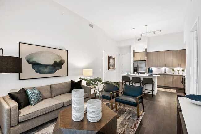 Kitchen, living, and dining areas with hard-surface vinyl plank flooring - Avalon Fort Lauderdale