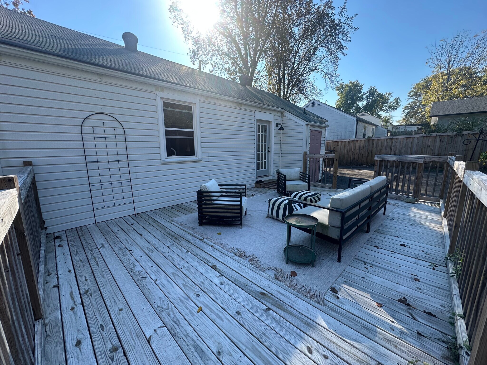 Back deck - comes with outdoor furniture. - 5623 Meadowcrest Ln
