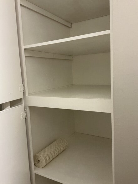 Deep linen closet in laundry - 21650 Burbank Blvd