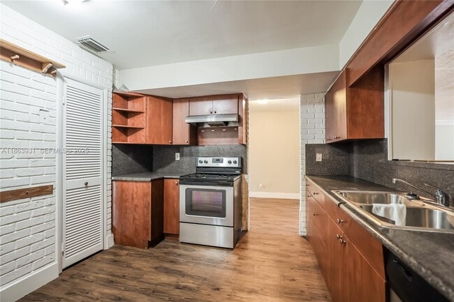 Building Photo - 5801 Royal Palm Blvd