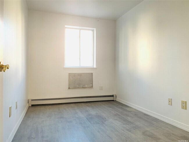 Building Photo - 22-15 119th St