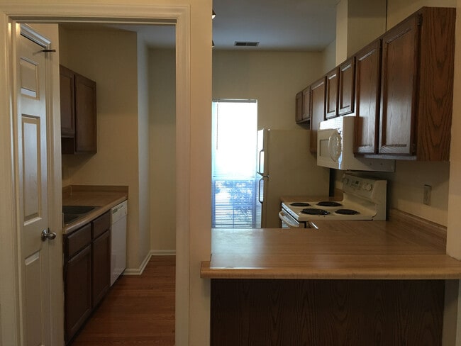 Building Photo - Great location off Millbrook near 70! 2 Bedroom ~2 bath~ pets negotiable! No HOA!