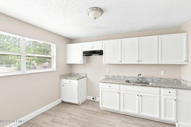 Building Photo - 6813 Tinkerbell Ln