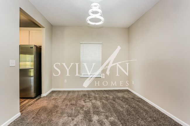 Building Photo - Turn the key. Enter. Smile. Repeat every day!