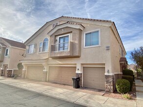 Building Photo - OVELY  2 BED ROOM 2 BATHROOM TOWNHOES LOCATED IN A GATED COMMUNITY IN HENDERSON