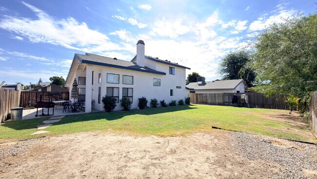 Building Photo - Spacious Two-Story Home with Large Backyard – Available Now!