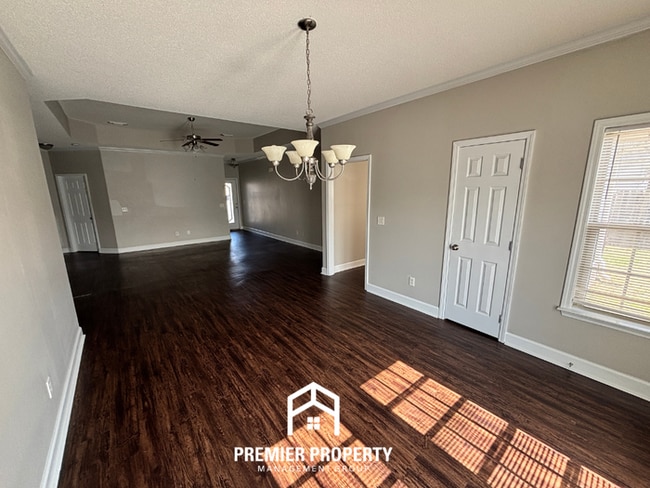 Building Photo - Charming 3BR Tuscaloosa Home | Hardwood Floors, Brick Fireplace, 2-Car Garage & Fenced Yard