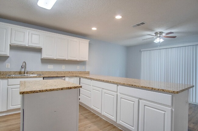 Building Photo - Modern 3BR/2BA Duplex with Granite Countertops, Stainless Appliances, Covered Patio & Private Fen...