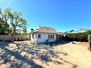 Building Photo - 6200 N Muscatel Ave