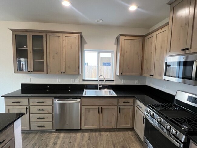 Building Photo - ALMOST NEW CONSTRUCTION/ 4 BEDROOM IN NEWER UPCOMING NEIGHBORHOOD