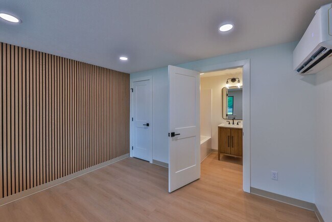 Building Photo - Modern Remodel with Designer Finishes | All Utilities Included