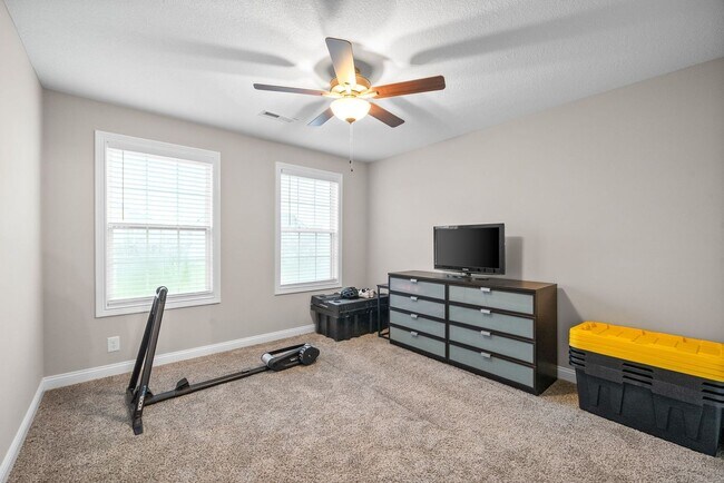 Building Photo - Stocked Pond, Walking Trails and More!!