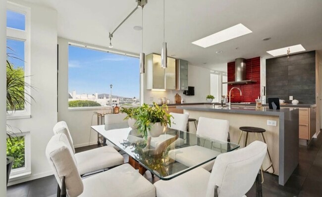 Building Photo - One-of-a-Kind Sophisticated Top-Floor Cond...