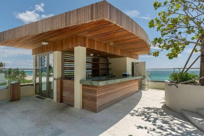 Building Photo - 18975 Collins Ave