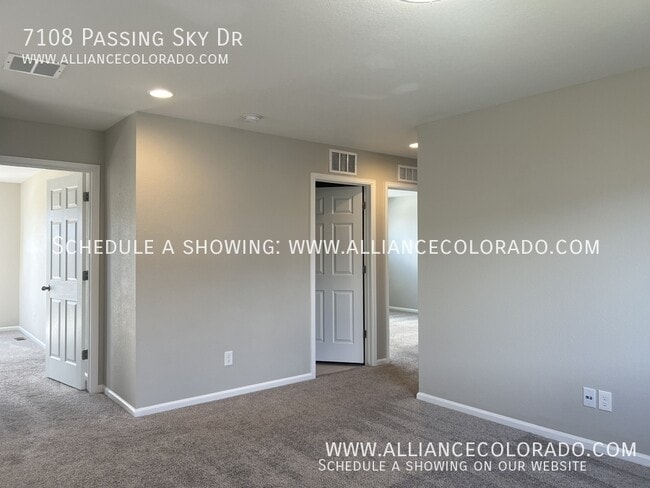 Building Photo - 7108 Passing Sky Dr