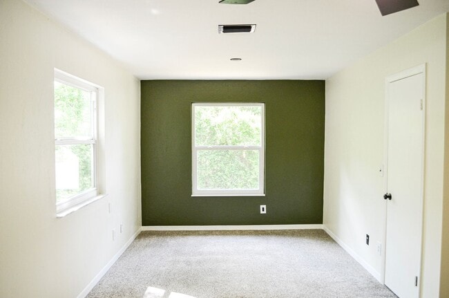 Building Photo - Check out this huge private fenced back yard at this Timberlane home!