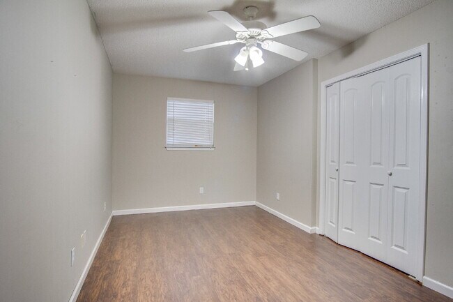 Building Photo - Live the Gulf Breeze Waterfront Life – Dock, Canal Access & Boat Lift!