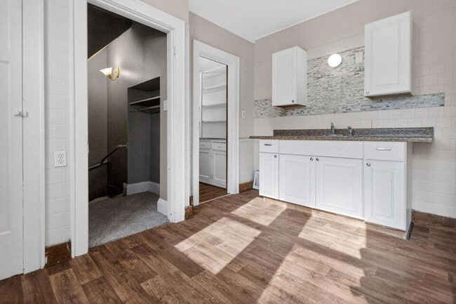 Building Photo - Spacious four bedroom home, available late June.